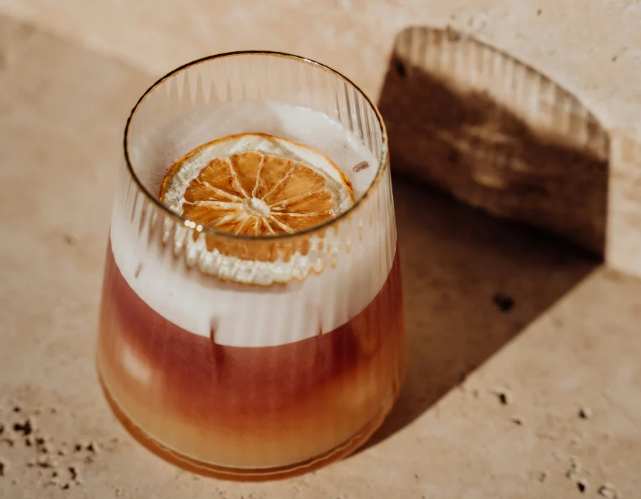 smokey vodka cocktail with citrus as garnish
