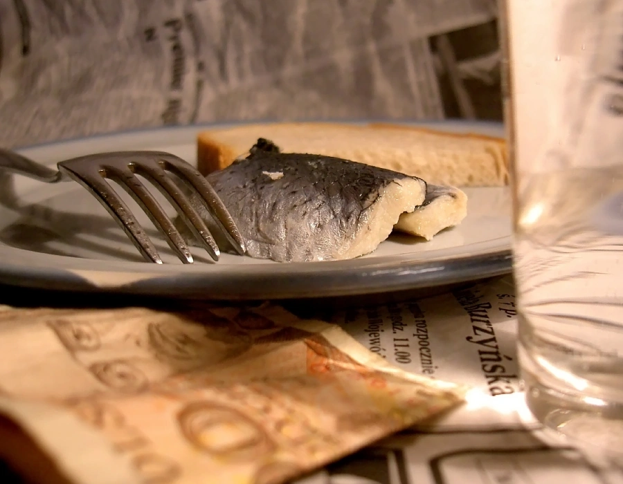 traditional polish fish dish served with vodka