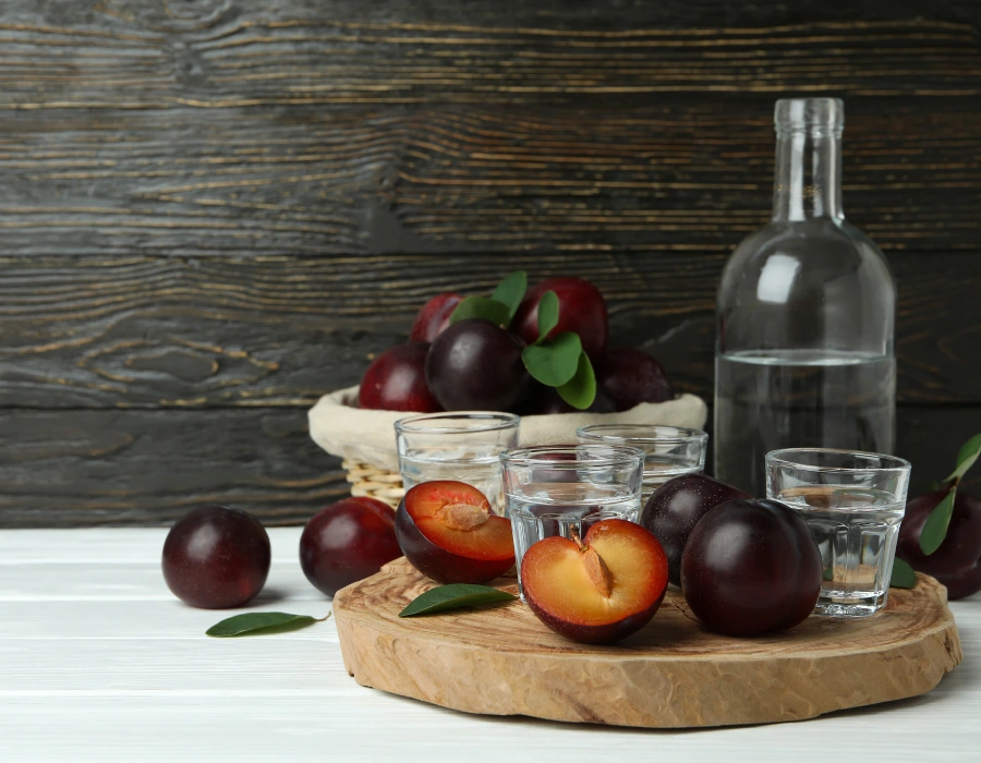 distilling botanicals next to bottle of vodka